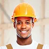 a man wearing a yellow hard hat